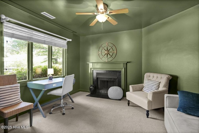 1957 Prestwick Ln, Wilmington, NC 28405 - carpeted home office featuring a premium fireplace and ceiling fan