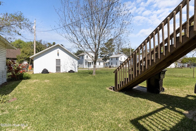 view of yard featuring stairs