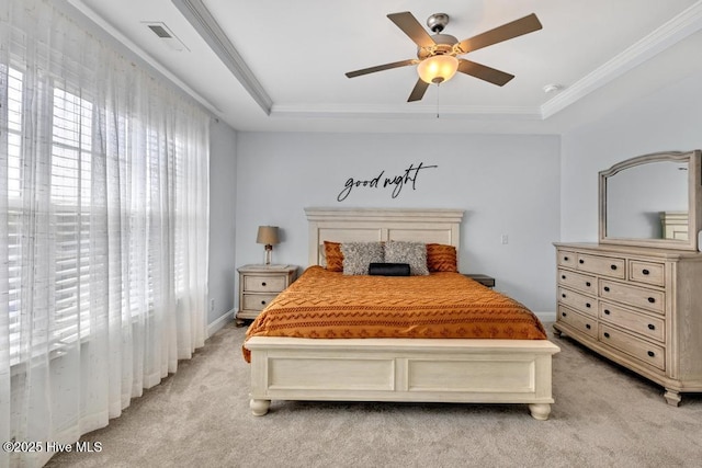 41 S Lamplighters Walk, Hampstead, NC 28443 - bedroom with a tray ceiling, light colored carpet, crown molding, a ceiling fan, and baseboards