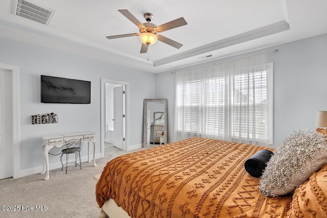 41 S Lamplighters Walk, Hampstead, NC 28443 - bedroom featuring a tray ceiling, carpet, baseboards, and a ceiling fan
