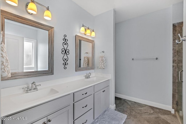 41 S Lamplighters Walk, Hampstead, NC 28443 - full bathroom featuring double vanity, a tile shower, and baseboards