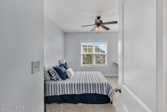 41 S Lamplighters Walk, Hampstead, NC 28443 - carpeted bedroom with baseboards and a ceiling fan
