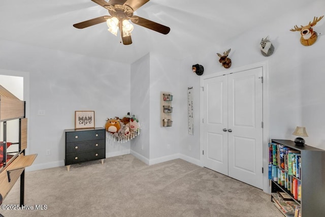 41 S Lamplighters Walk, Hampstead, NC 28443 - bedroom with carpet flooring, a closet, baseboards, and a ceiling fan
