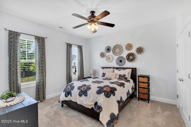 41 S Lamplighters Walk, Hampstead, NC 28443 - bedroom featuring carpet flooring, baseboards, and multiple windows