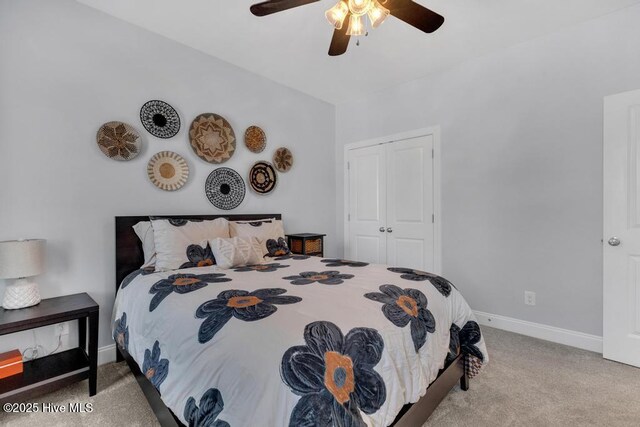 41 S Lamplighters Walk, Hampstead, NC 28443 - carpeted bedroom featuring a closet, baseboards, and a ceiling fan