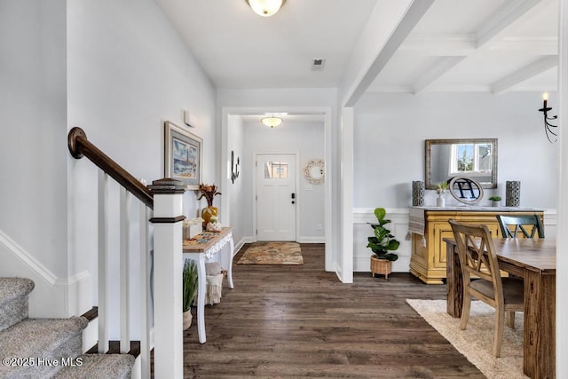 41 S Lamplighters Walk, Hampstead, NC 28443 - entryway with dark wood-style flooring, stairway, beamed ceiling, and crown molding