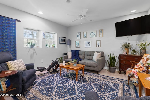 living room with ceiling fan, recessed lighting, wood finished floors, and baseboards
