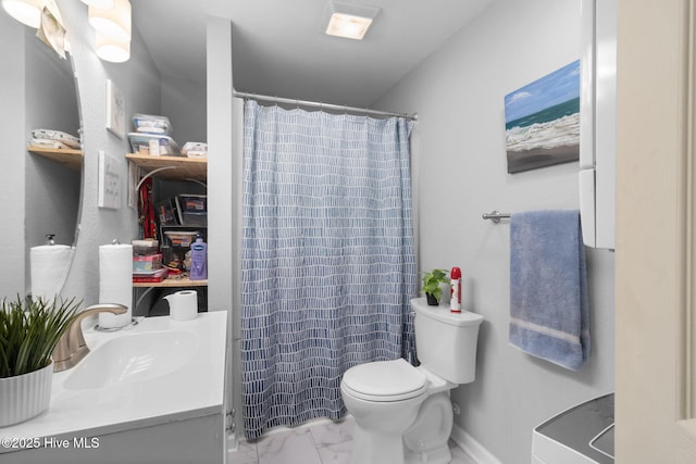full bath featuring toilet, marble finish floor, a shower with shower curtain, and vanity