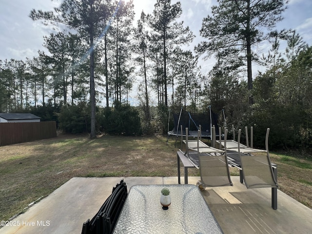 view of yard featuring a trampoline
