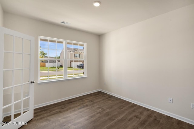 2012 Minnette Cir, New Bern, NC 28562 - empty room with baseboards, dark wood-style floors, and visible vents