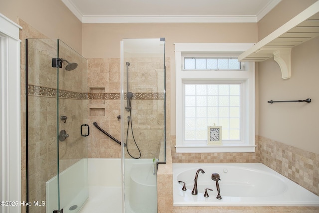 bathroom with crown molding, a shower stall, and a bath