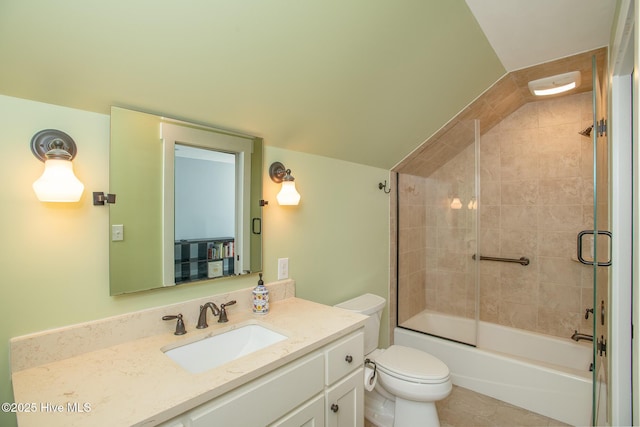 bathroom featuring vanity, tile patterned flooring, toilet, and bathing tub / shower combination