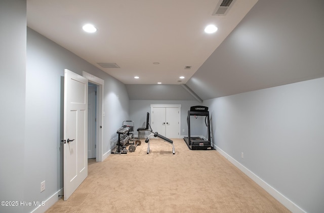 exercise room with visible vents, recessed lighting, and light carpet
