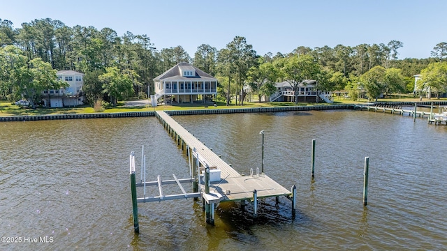 view of dock with boat lift and a water view