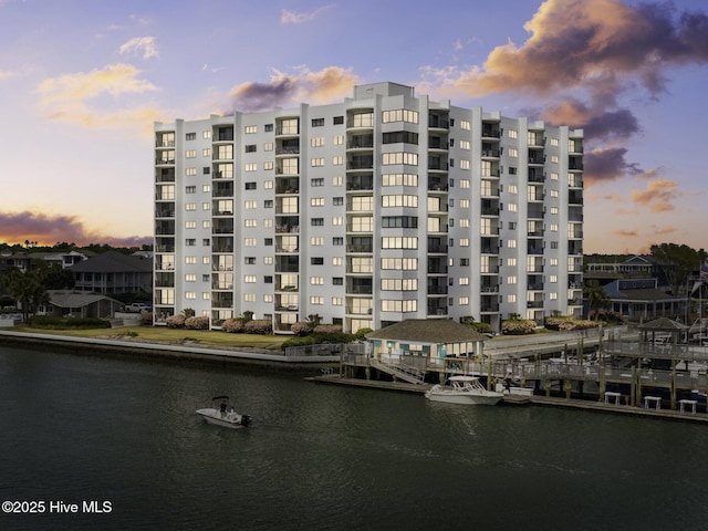 322 Causeway Dr Ste 1001, Wrightsville Beach, NC 28480 - property at dusk with a water view