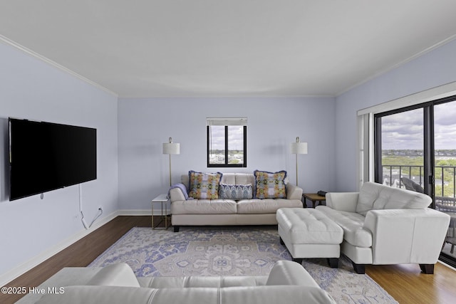 322 Causeway Dr Ste 1001, Wrightsville Beach, NC 28480 - living area with wood finished floors, ornamental molding, and a wealth of natural light