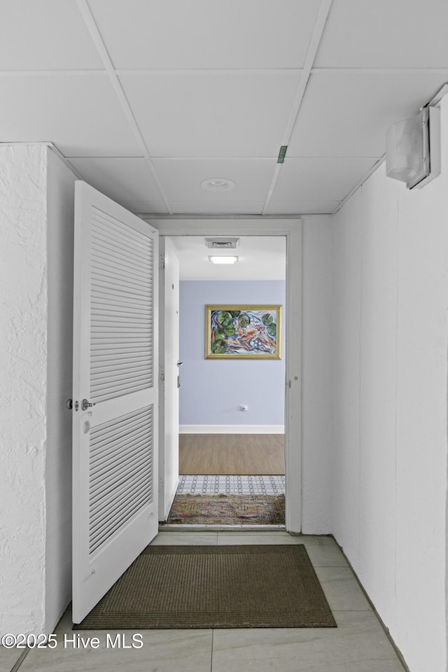 322 Causeway Dr Ste 1001, Wrightsville Beach, NC 28480 - hallway featuring a drop ceiling