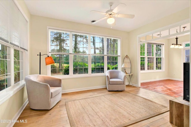 154 Windsor Cir SW, Ocean Isle Beach, NC 28469 - sitting room with baseboards, ceiling fan, and wood finished floors