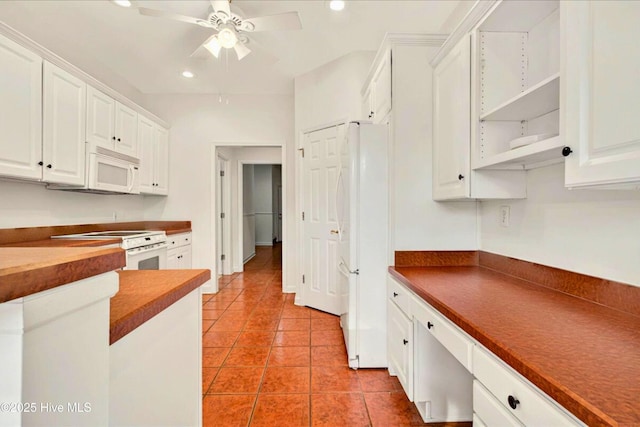 154 Windsor Cir SW, Ocean Isle Beach, NC 28469 - kitchen featuring white appliances, white cabinets, a ceiling fan, light tile patterned floors, and recessed lighting