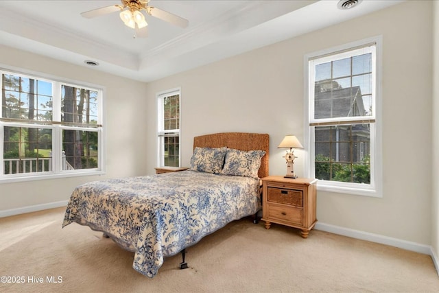 154 Windsor Cir SW, Ocean Isle Beach, NC 28469 - bedroom with light carpet, multiple windows, baseboards, and ornamental molding