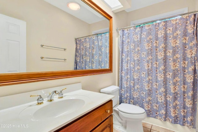 154 Windsor Cir SW, Ocean Isle Beach, NC 28469 - full bath with vanity, toilet, tile patterned flooring, and curtained shower