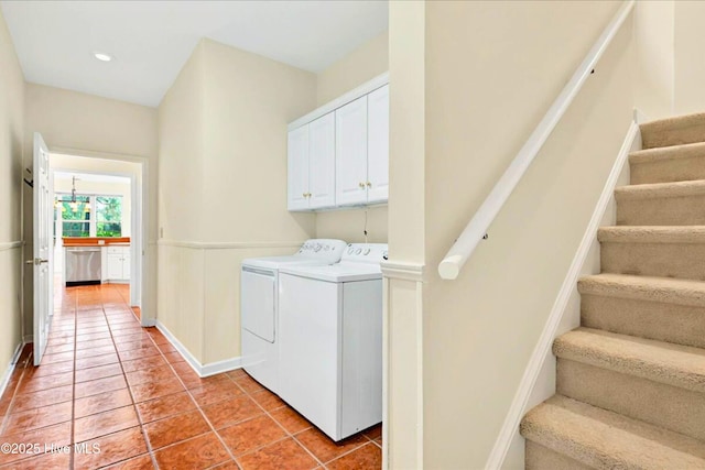 154 Windsor Cir SW, Ocean Isle Beach, NC 28469 - washroom with washing machine and dryer, light tile patterned floors, cabinet space, baseboards, and recessed lighting