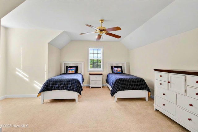 154 Windsor Cir SW, Ocean Isle Beach, NC 28469 - bedroom with light carpet, vaulted ceiling, baseboards, ceiling fan, and a multi sided fireplace