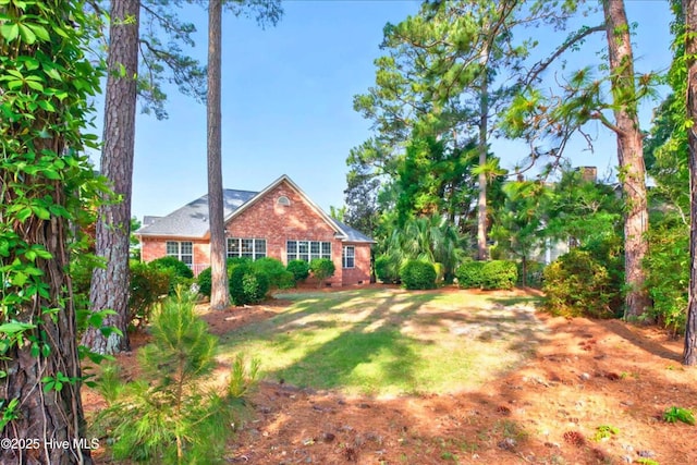 154 Windsor Cir SW, Ocean Isle Beach, NC 28469 - view of grassy yard