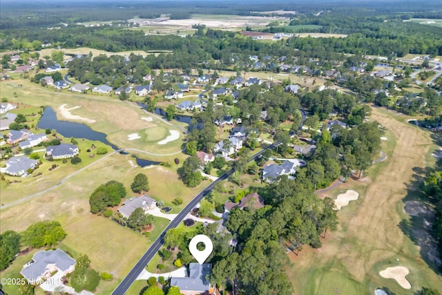 154 Windsor Cir SW, Ocean Isle Beach, NC 28469 - view of property location with nearby suburban area, a large body of water, and a golf club