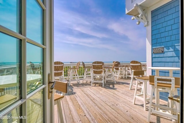 154 Windsor Cir SW, Ocean Isle Beach, NC 28469 - wooden terrace featuring a water view
