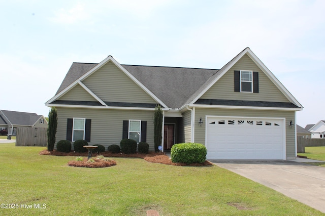 107 Pinyon Ln, Ayden, NC 28513 - view of front facade with roof with shingles, driveway, a front yard, and a garage