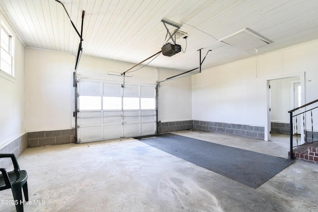 garage featuring a garage door opener