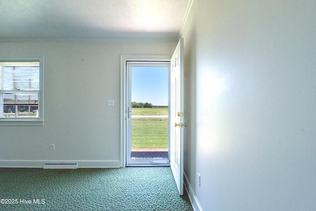 doorway featuring ornamental molding, visible vents, baseboards, and carpet flooring