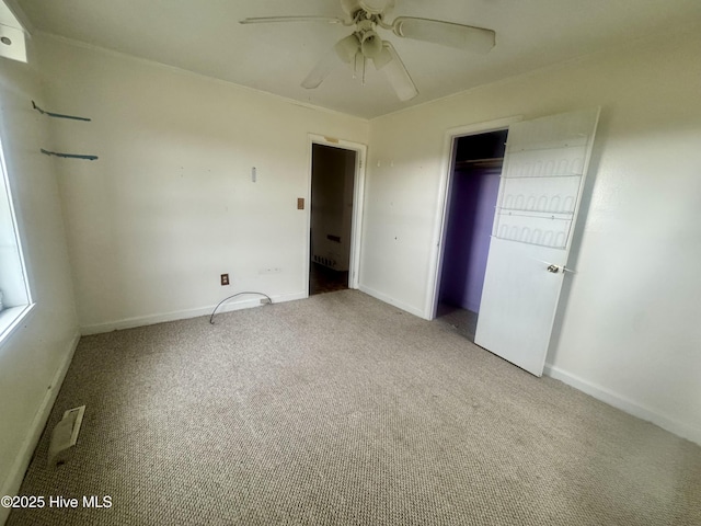 1505 Dover Fort Barnwell Rd, Dover, NC 28526 - unfurnished bedroom with carpet floors, baseboards, ceiling fan, and a closet