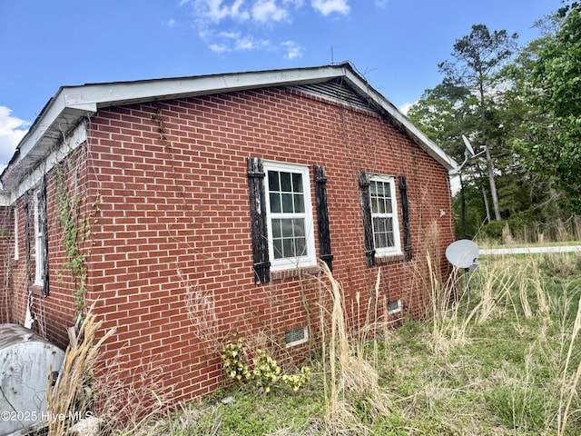 1505 Dover Fort Barnwell Rd, Dover, NC 28526 - view of side of property featuring brick siding and crawl space