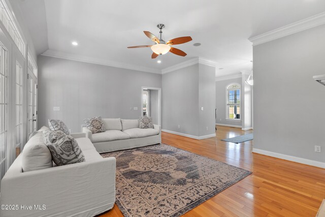 103 Arabian Cir, Beulaville, NC 28518 - living room with recessed lighting, ceiling fan, light wood-style floors, baseboards, and crown molding