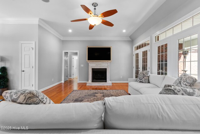103 Arabian Cir, Beulaville, NC 28518 - living area featuring wood finished floors, a ceiling fan, ornamental molding, recessed lighting, and baseboards