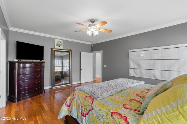 103 Arabian Cir, Beulaville, NC 28518 - bedroom featuring wood finished floors, ornamental molding, baseboards, and a ceiling fan