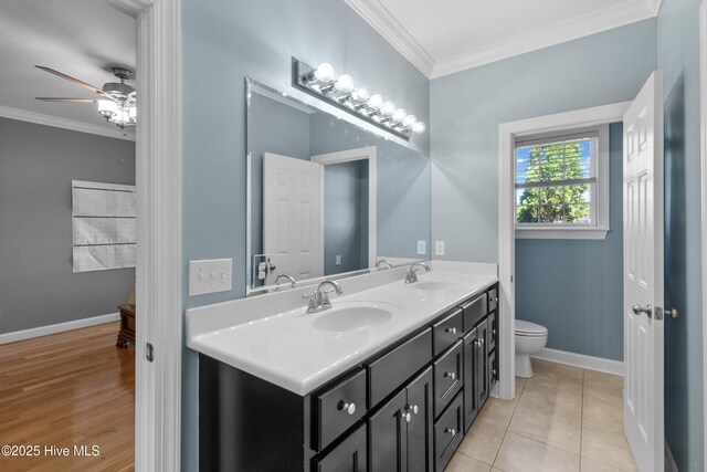 103 Arabian Cir, Beulaville, NC 28518 - full bath with crown molding, double vanity, a ceiling fan, toilet, and baseboards