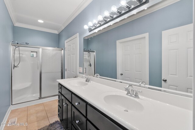 103 Arabian Cir, Beulaville, NC 28518 - full bathroom featuring ornamental molding, a shower stall, tile patterned floors, and double vanity
