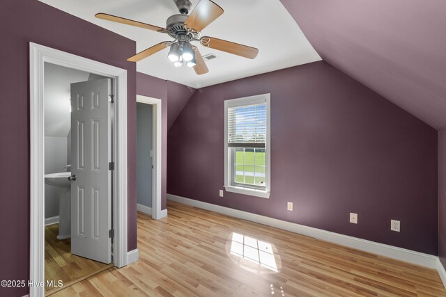 103 Arabian Cir, Beulaville, NC 28518 - bonus room featuring lofted ceiling, light wood finished floors, a ceiling fan, and baseboards
