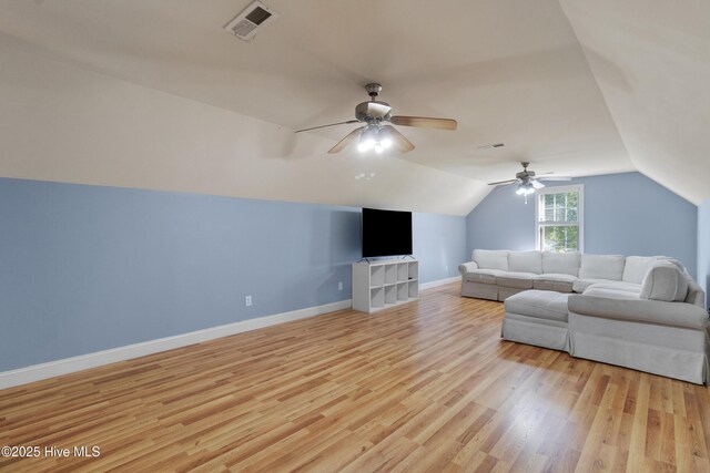 103 Arabian Cir, Beulaville, NC 28518 - living area featuring ceiling fan, light wood-style floors, vaulted ceiling, and baseboards