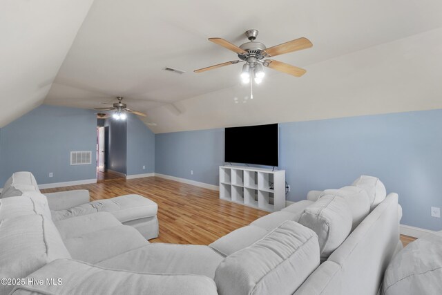103 Arabian Cir, Beulaville, NC 28518 - living room with ceiling fan, wood finished floors, vaulted ceiling, and baseboards