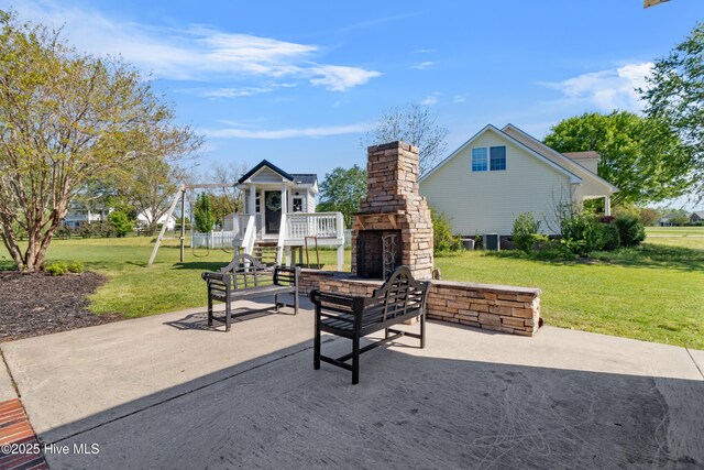 103 Arabian Cir, Beulaville, NC 28518 - view of patio with an outdoor stone fireplace