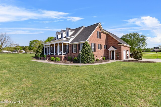103 Arabian Cir, Beulaville, NC 28518 - view of home's exterior with brick siding, a yard, and a garage