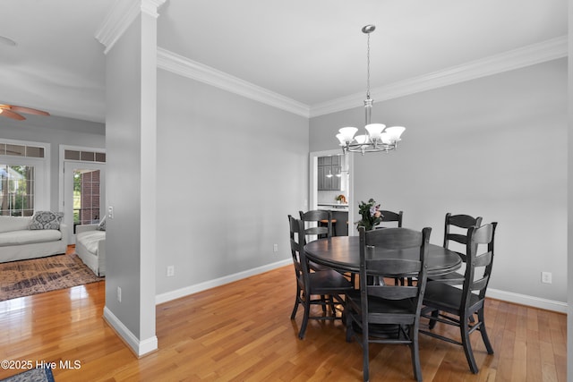 103 Arabian Cir, Beulaville, NC 28518 - dining space featuring crown molding, a ceiling fan, light wood-style floors, a chandelier, and baseboards