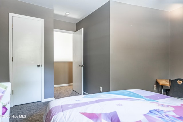 124 Shenandoah Rd E, West End, NC 27376 - carpeted bedroom featuring baseboards
