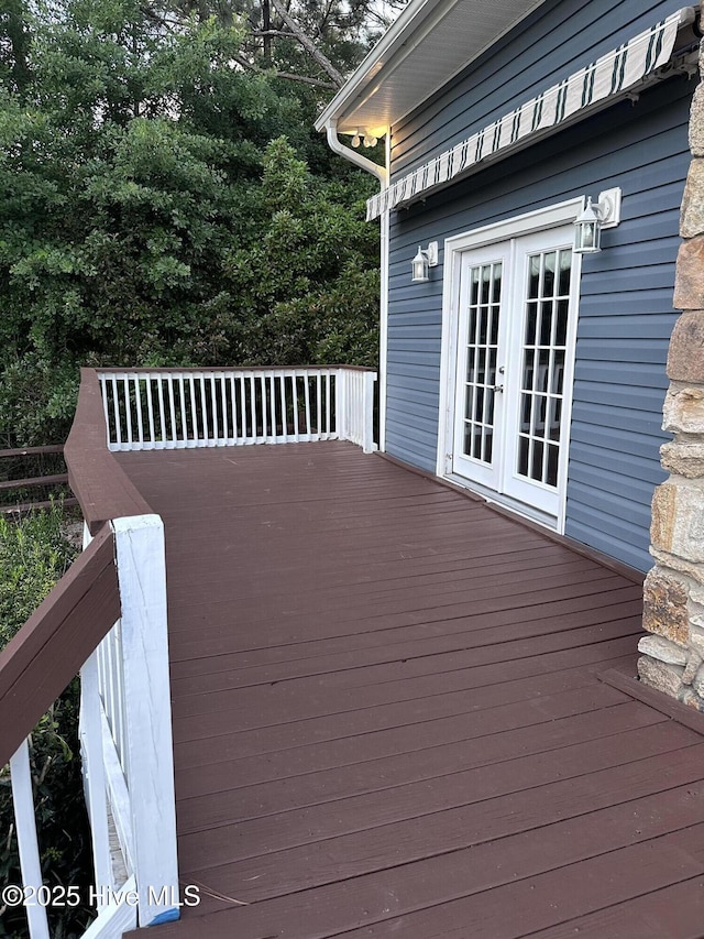 124 Shenandoah Rd E, West End, NC 27376 - wooden terrace with french doors