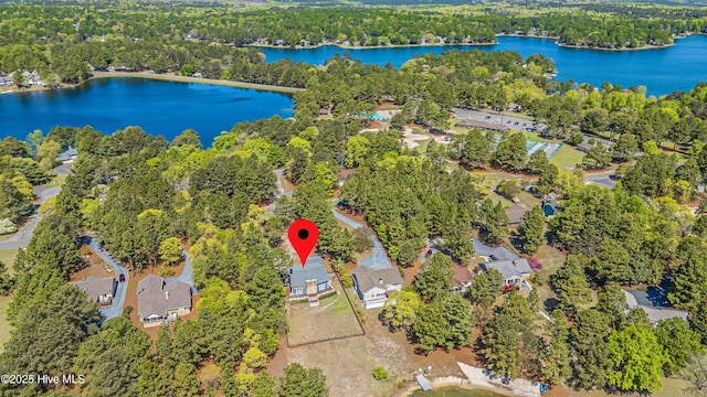 124 Shenandoah Rd E, West End, NC 27376 - view of property location with a large body of water, a heavily wooded area, and nearby suburban area