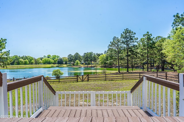 124 Shenandoah Rd E, West End, NC 27376 - deck with a water view and view of wooded area